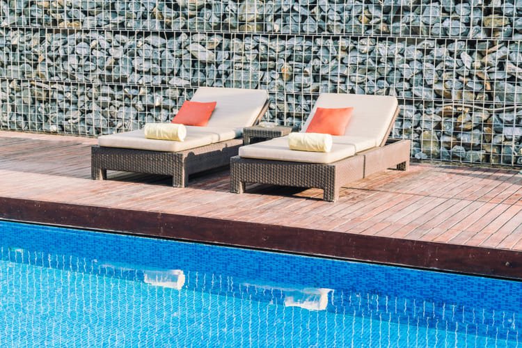 elegance pools and outdoors - Best Pool Deck Materials for South Florida Pros Cons & Cost Comparison (2026 Guide)