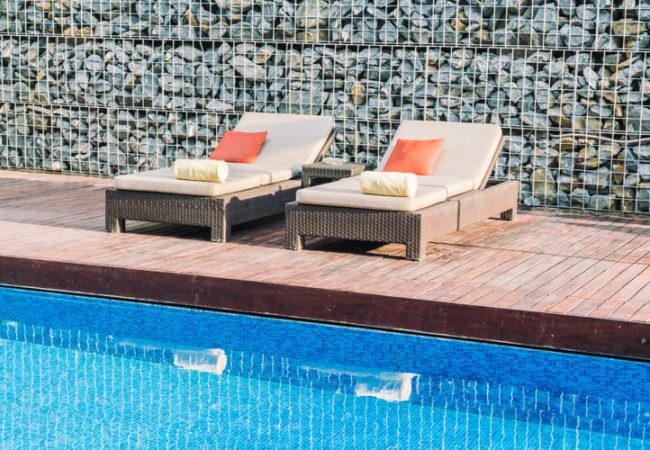 elegance pools and outdoors - Best Pool Deck Materials for South Florida Pros Cons & Cost Comparison (2026 Guide)